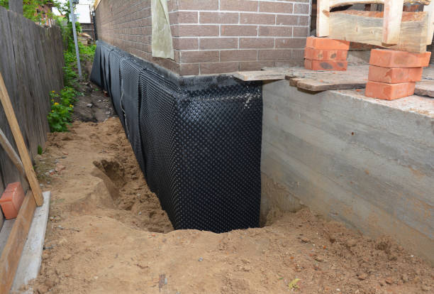 Happy homeowners after waterproofing job in Cranbury